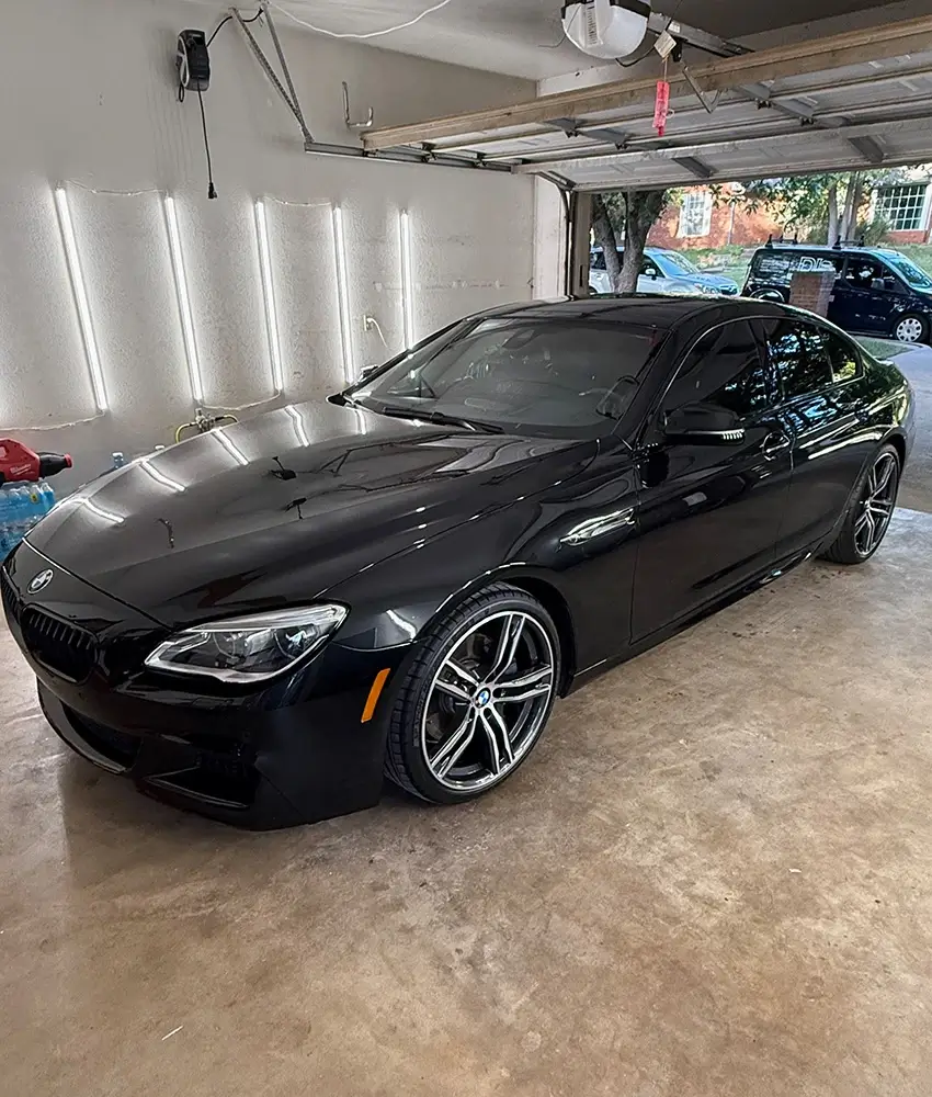 BMW in garage after detailing service